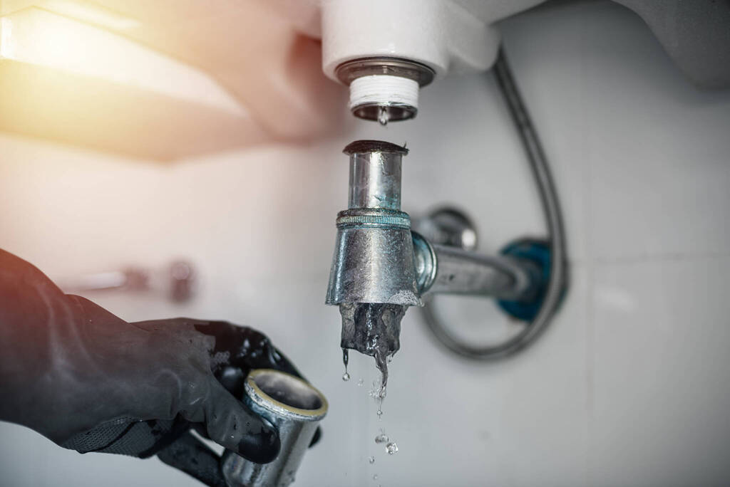 Clogged And Leaky Sink Sewer