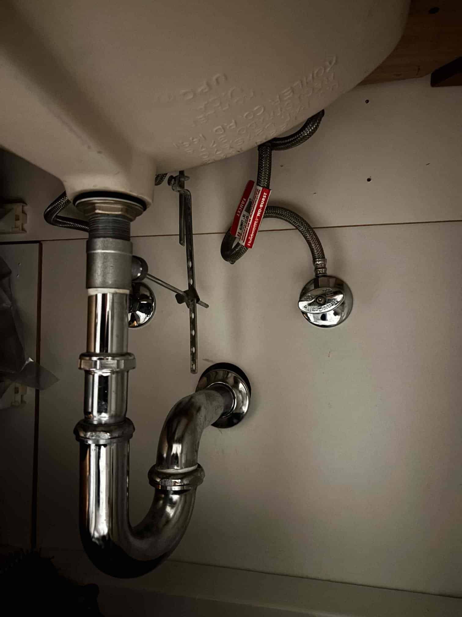 Before: Corroded kitchen sink drain assembly in Sebastopol home